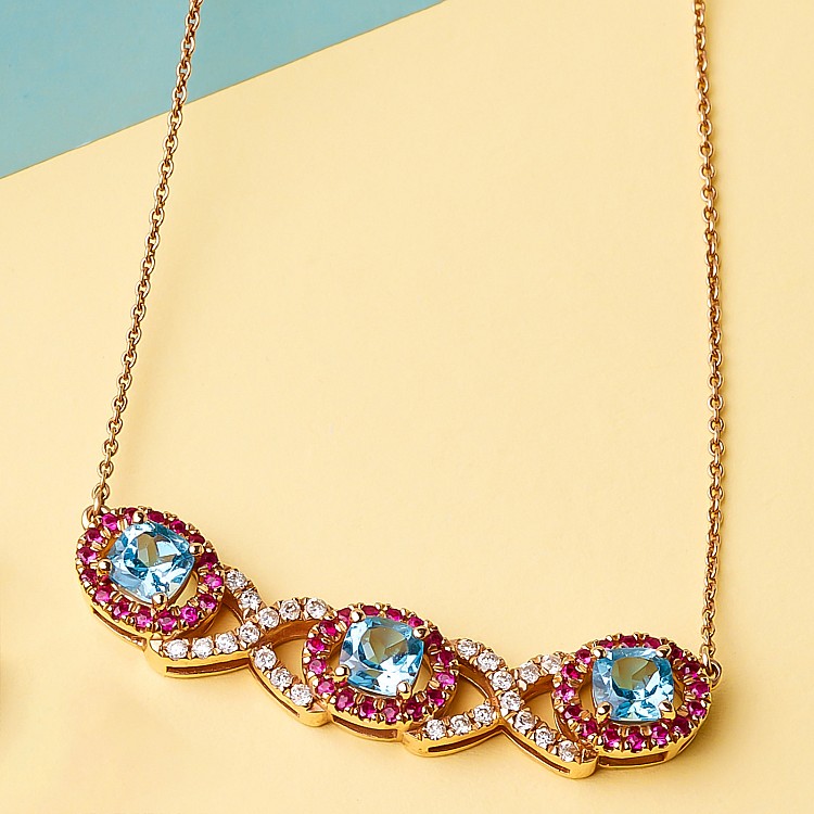 Gold pendant with rubies and topaz diamonds pan2705