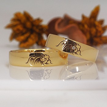 Eheringe V1678 in Gold oder Platin mit Wellenmuster-Diamant