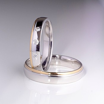 Trouwringen v1096 in wit en geel goud met diamanten