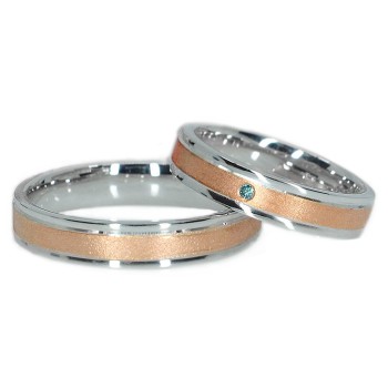 Trouwringen v0481 Mat gezandstraald goud, twee kleuren met blauwe diamant