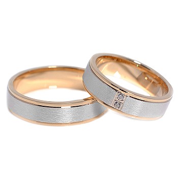 Trouwringen v056 in goud met diamanten