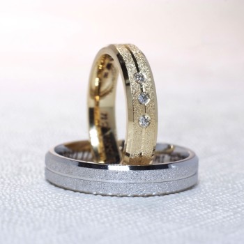 Trouwringen v1173 in goud of platina met diamanten