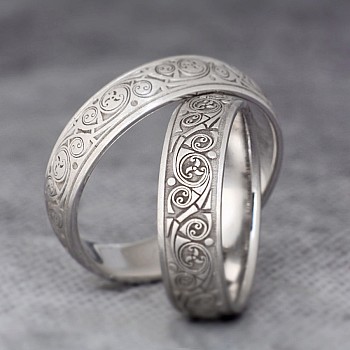 Anillos de boda de oro o platino con diseño láser - modelo v183