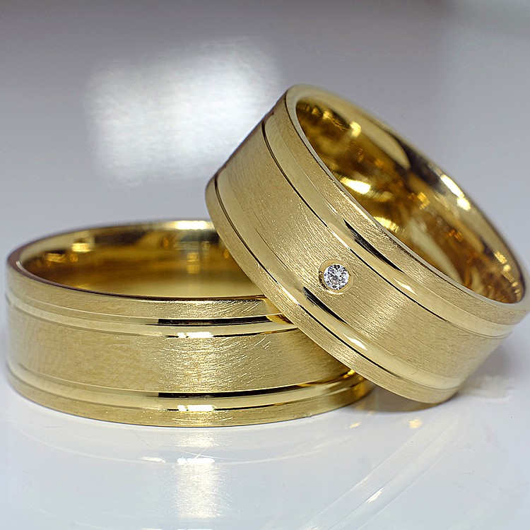 V426 Fedi nuziali in oro e diamanti