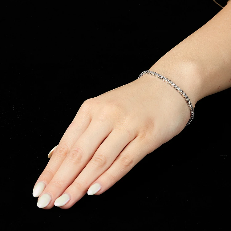 Gold tennis bracelet with colorless Diamonds 3.25ct br2687