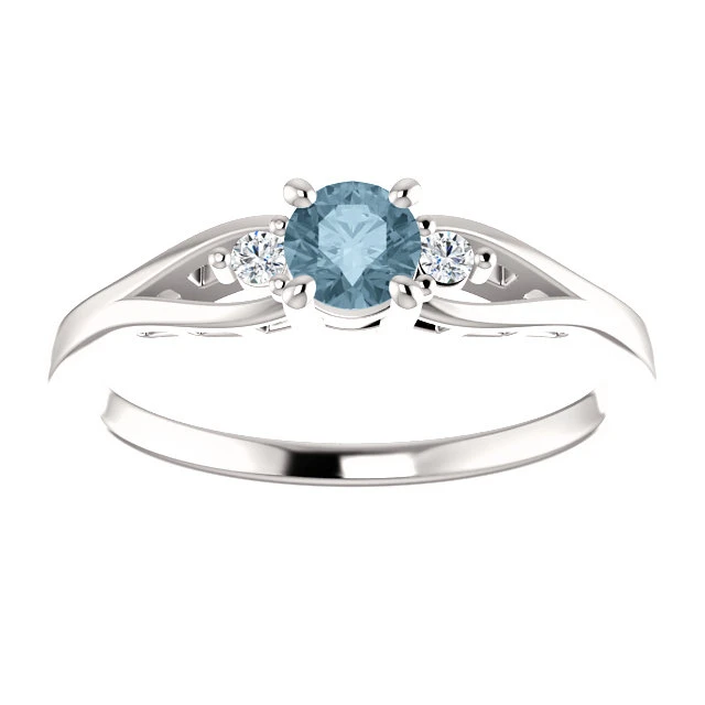 Verlovingsring i71843DbDI in goud met blauwe diamant en kleurloze diamanten