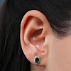 Pendientes de oro con halo, esmeraldas ovaladas y diamantes - modelo c3153