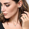 Pendientes de oro con halo, esmeraldas ovaladas y diamantes - modelo c3153