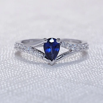 Gold-Verlobungsring i533SfPaDi mit tränenförmigem Saphir und Diamanten