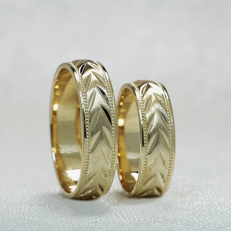Gouden trouwringen v1121 met Spike en Randalina Design