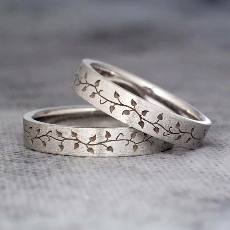 Anillos de boda de oro o platino con diseño láser inspirado en la naturaleza - modelo v1189