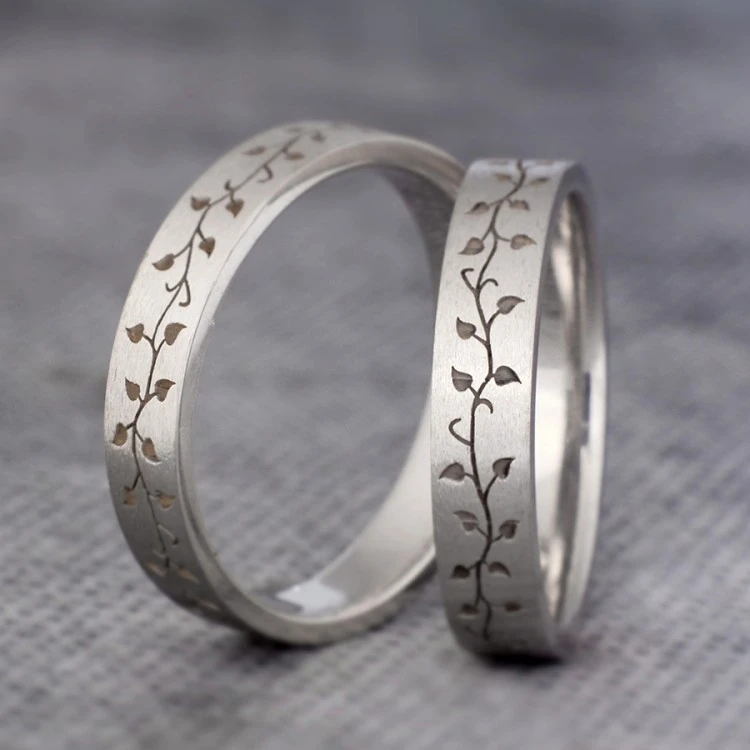 Anillos de boda de oro o platino con diseño láser inspirado en la naturaleza - modelo v1189
