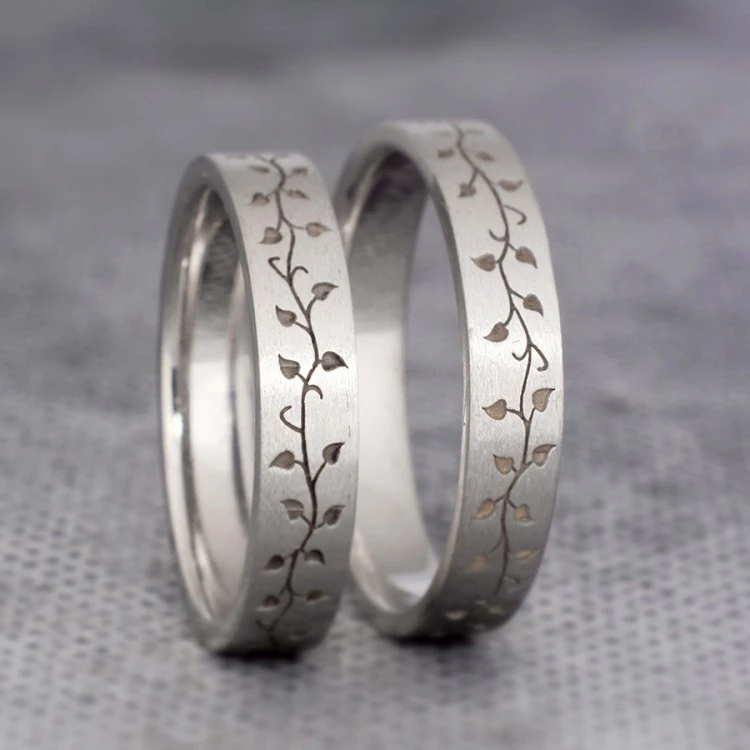 Anillos de boda de oro o platino con diseño láser inspirado en la naturaleza - modelo v1189