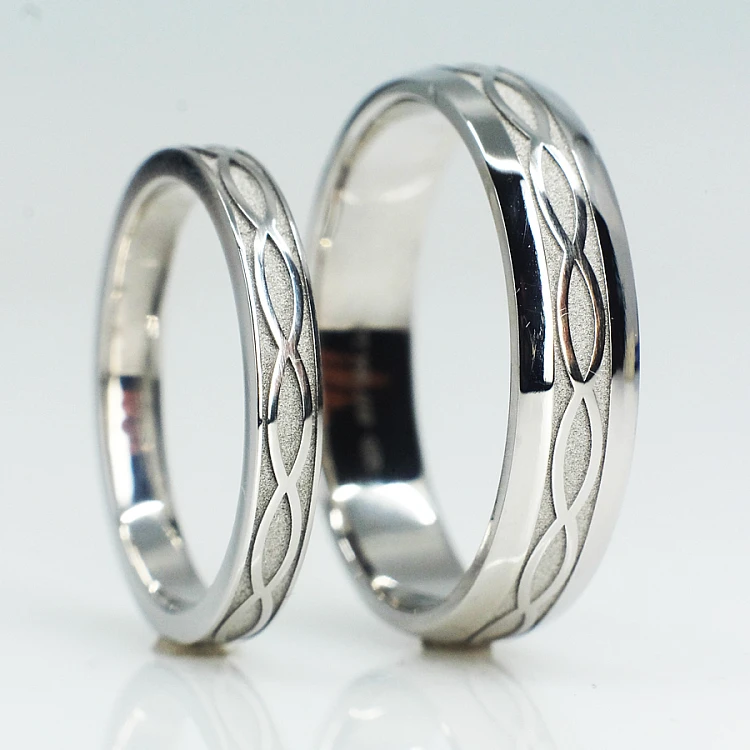Eheringe v1557 in Gold oder Platin mit Infinity-Muster