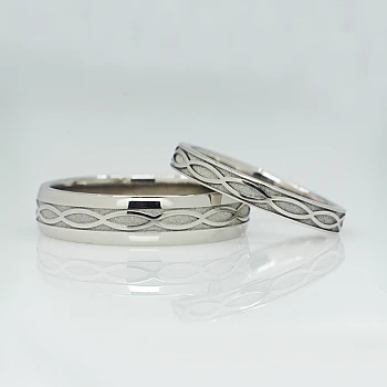 Anillos de boda de oro o platino con diseño de infinito - modelo v1557