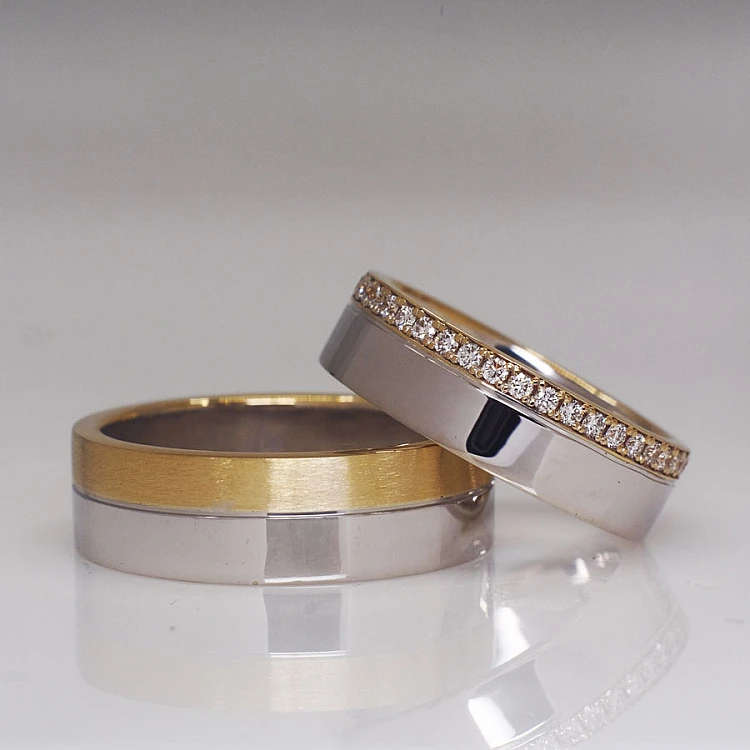 Fedi nuziali v224 in due colori di oro o platino con diamanti