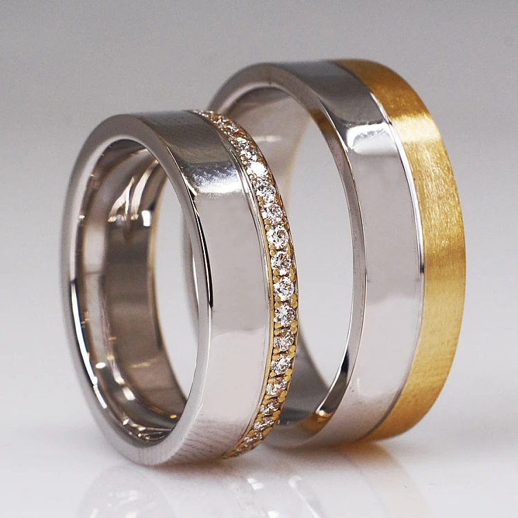 Fedi nuziali v224 in due colori di oro o platino con diamanti