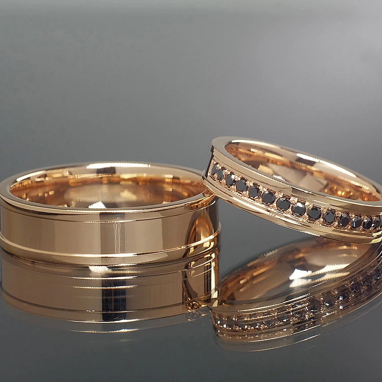 Gouden v968dn trouwringen met zwarte diamanten
